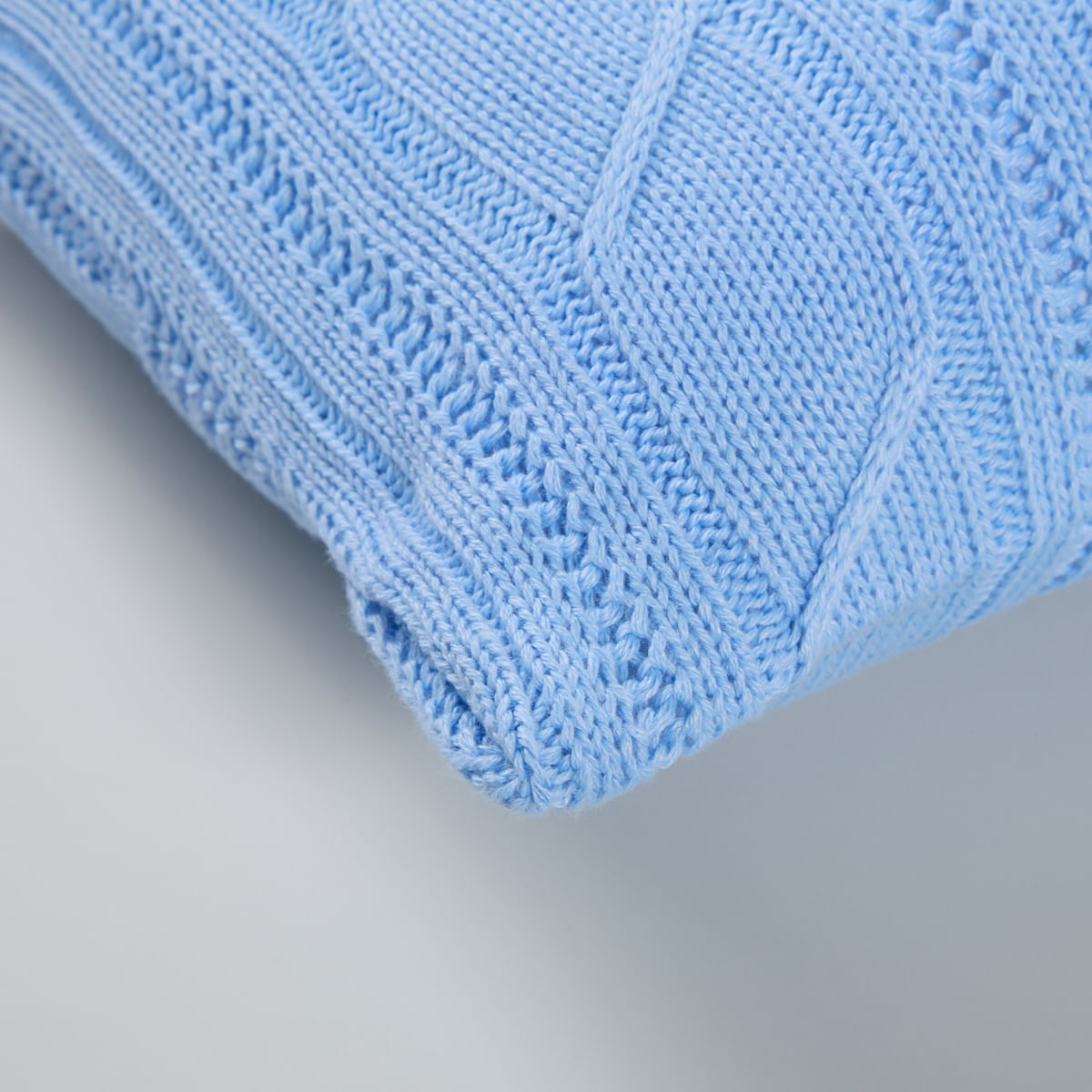 01--01-0220-Capa-de-Almofada-Tricot-Trancas-Azul-Claro